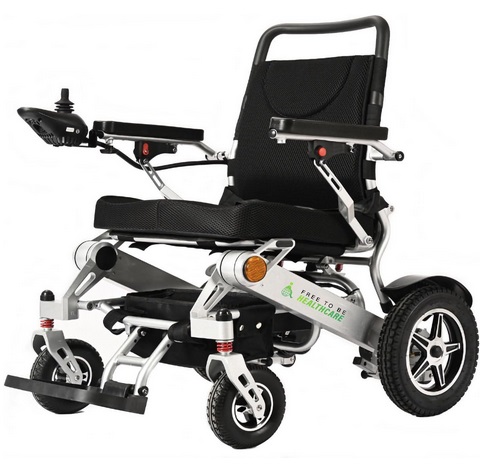 Free to Be Mobility Lightweight Aluminium Electric Wheelchair Powerchair Folding Heavy Duty by Free To Be Mobility Equipment 2 x Battery Supplied 500W Motors